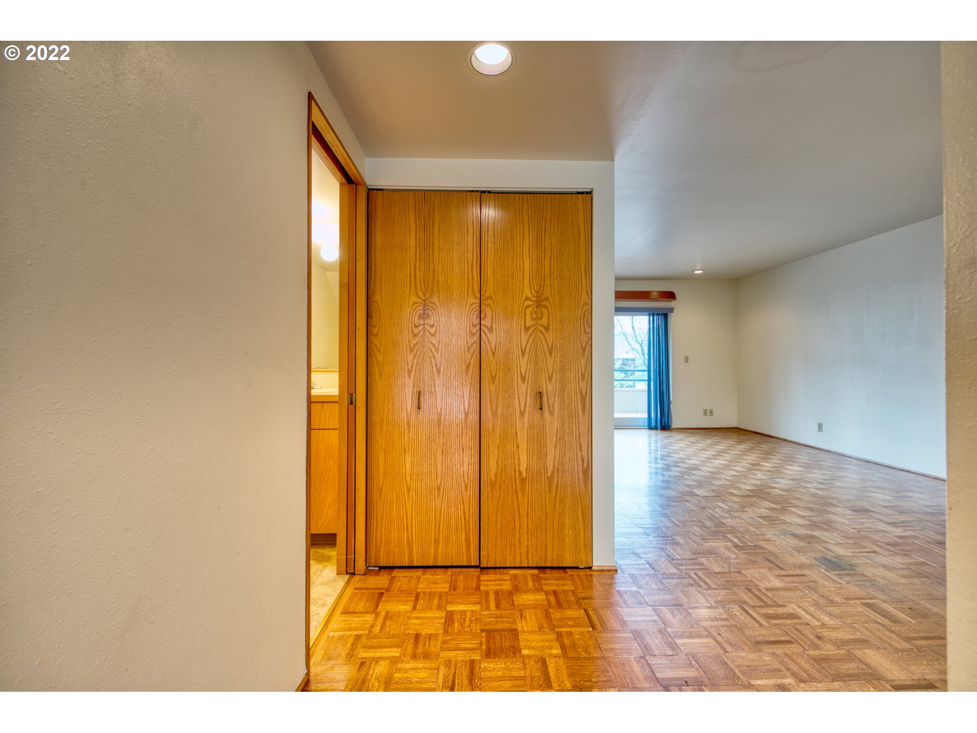 974 Lincoln Street Eugene, OR 97401 - Photo 7 of 32 a view of an empty room and wooden floor