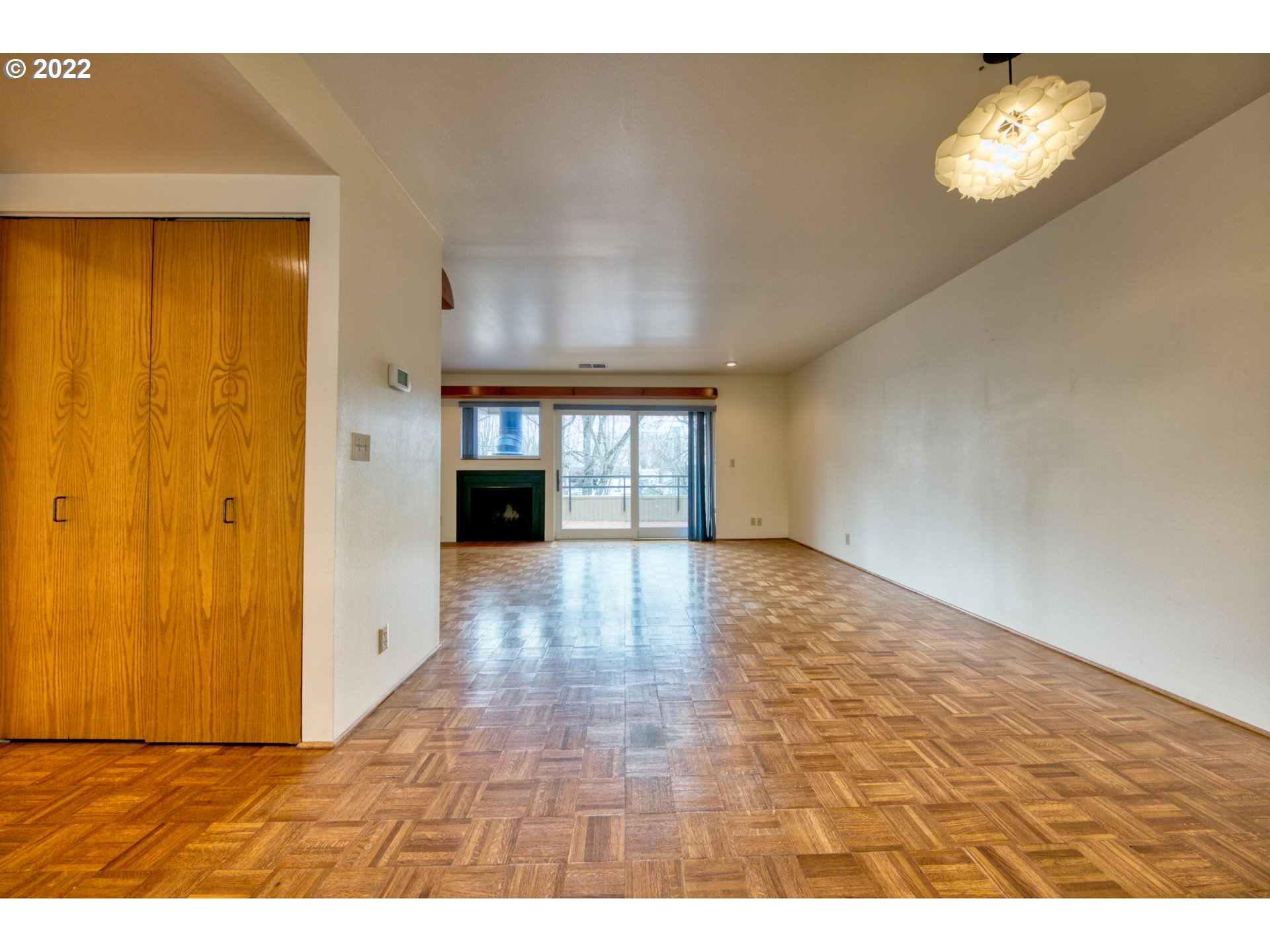 974 Lincoln Street Eugene, OR 97401 - Photo 9 of 32 a view of empty room with a fireplace