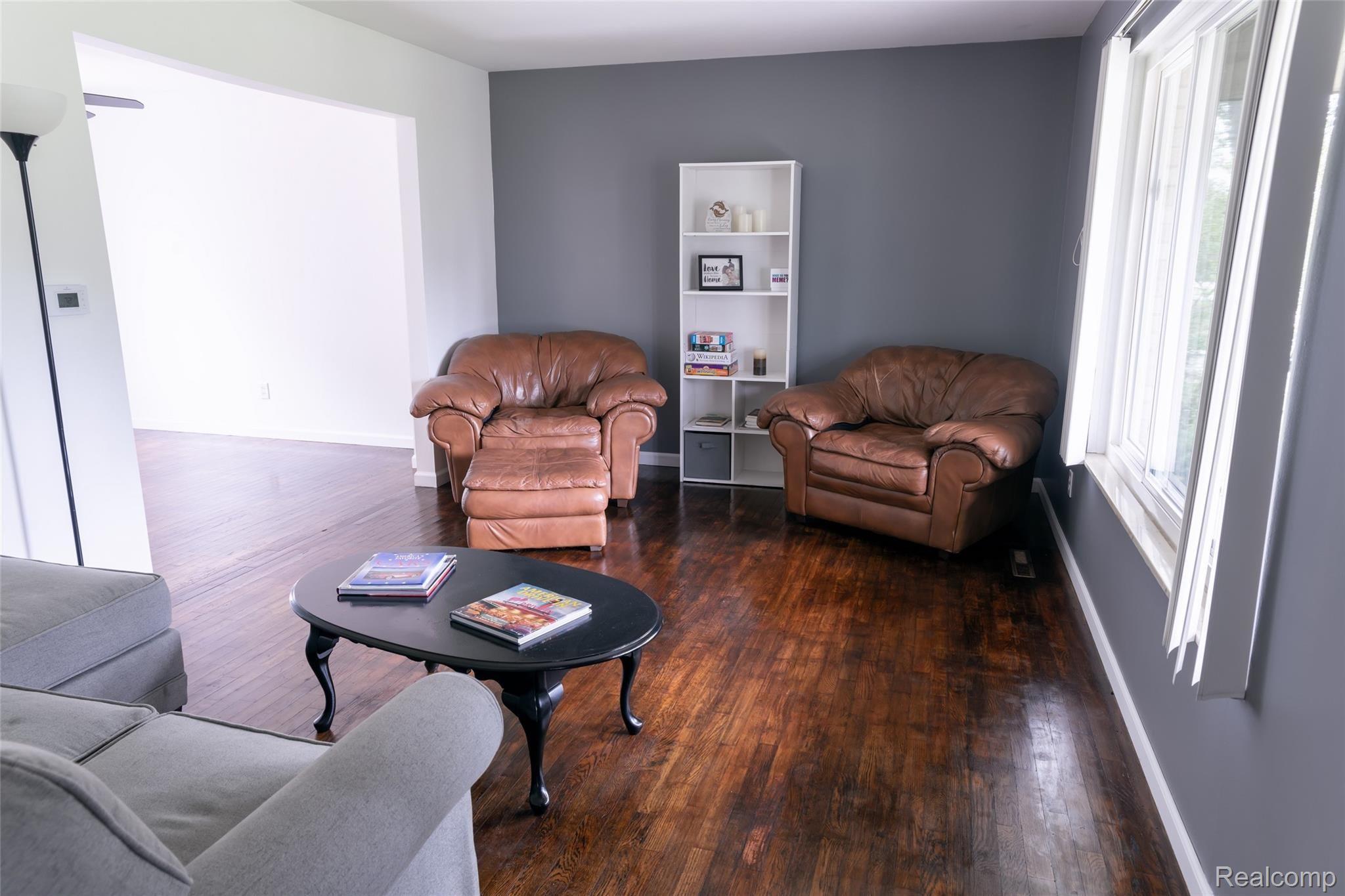 2271 Crane Road Fenton, MI 48430 - Photo 8 of 32 Hard Wood Flooring In Living Room, Dining Room & Bedrooms!