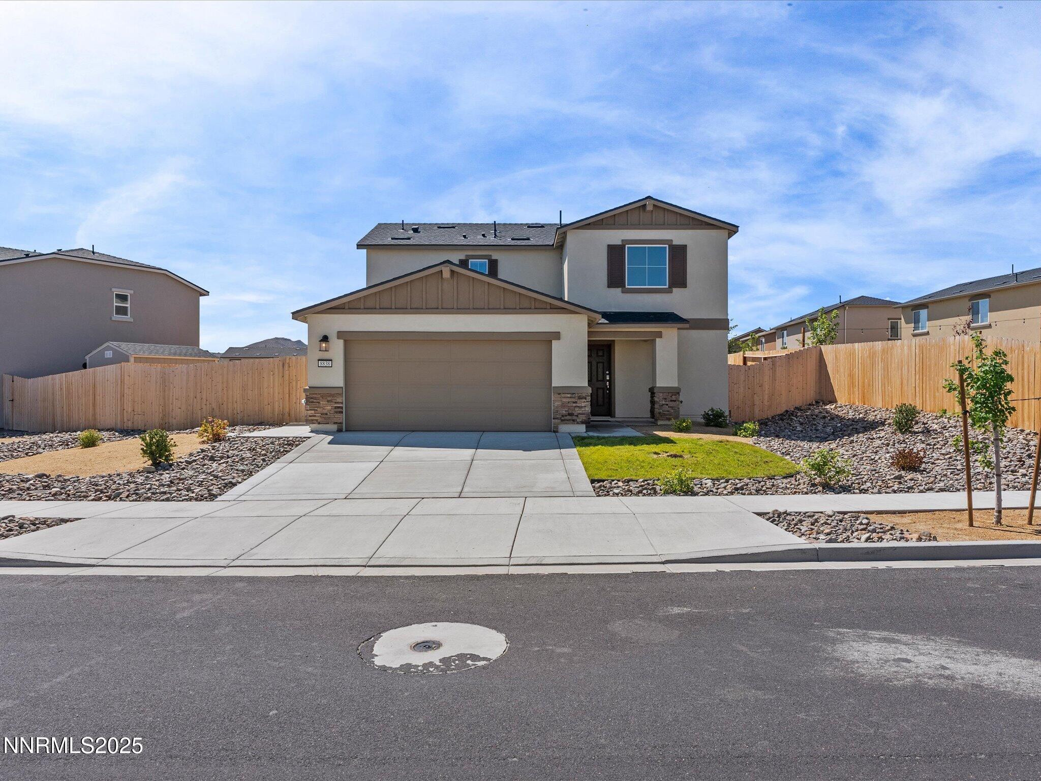 8838 Finnsech Drive Reno, NV 89506 - Photo 1 of 44 a view of a house with a tub and a yard