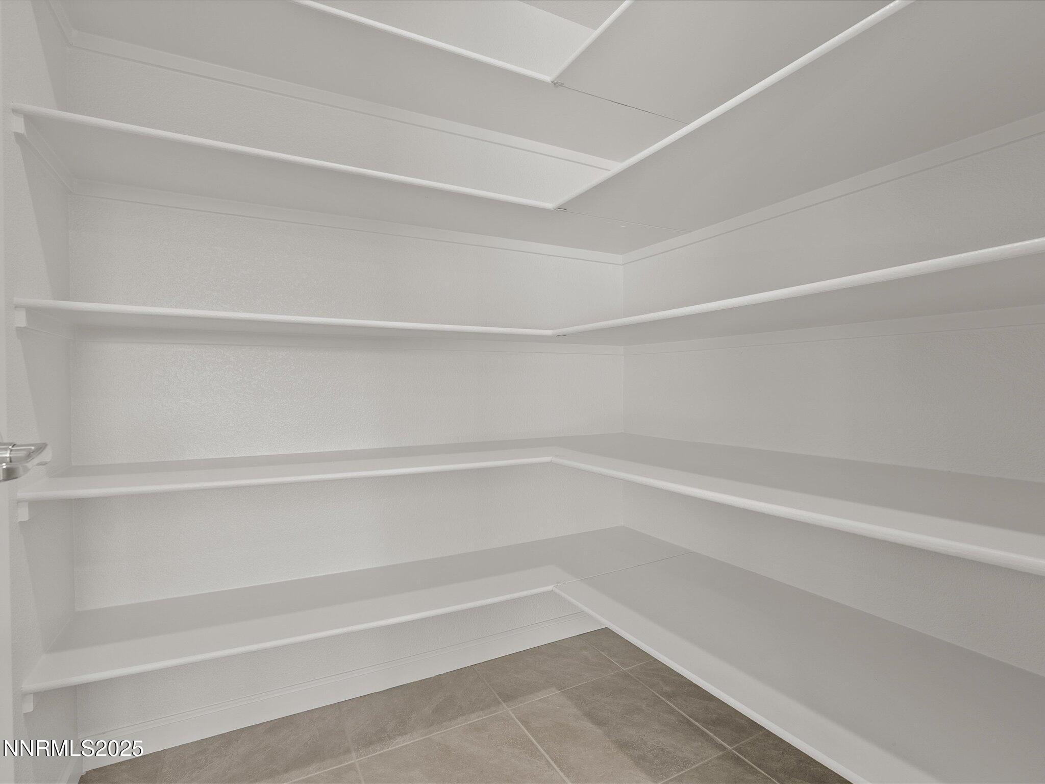 8838 Finnsech Drive Reno, NV 89506 - Photo 17 of 44 a empty closet with white paint