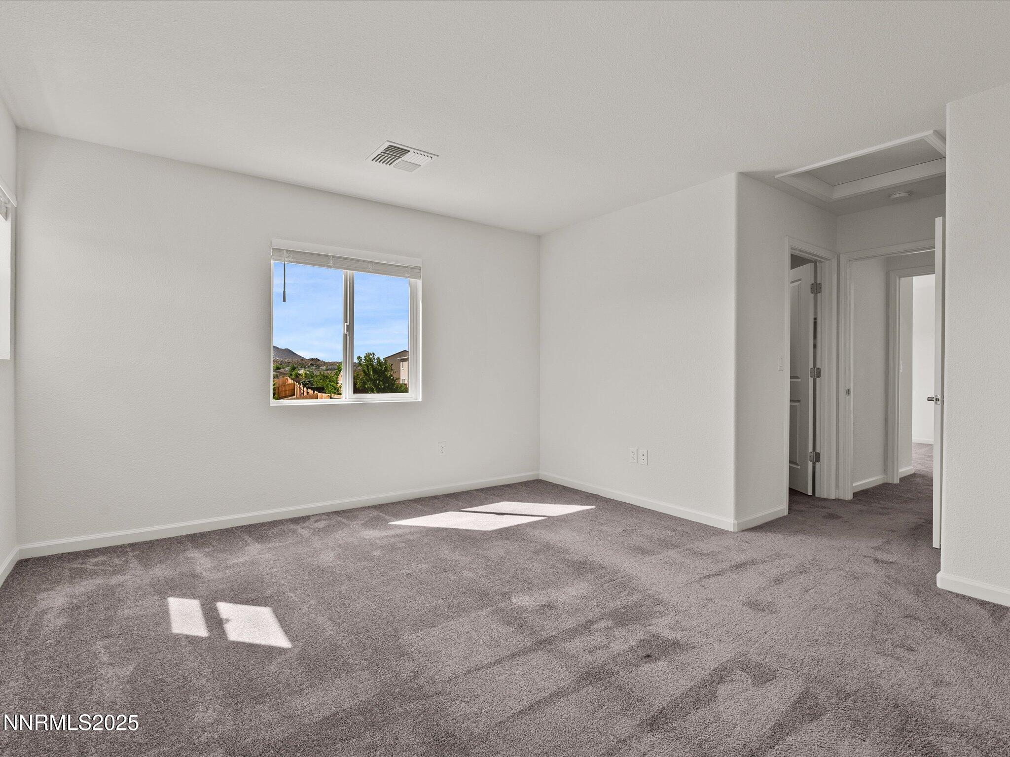 8838 Finnsech Drive Reno, NV 89506 - Photo 26 of 44 a view of an empty room with a window