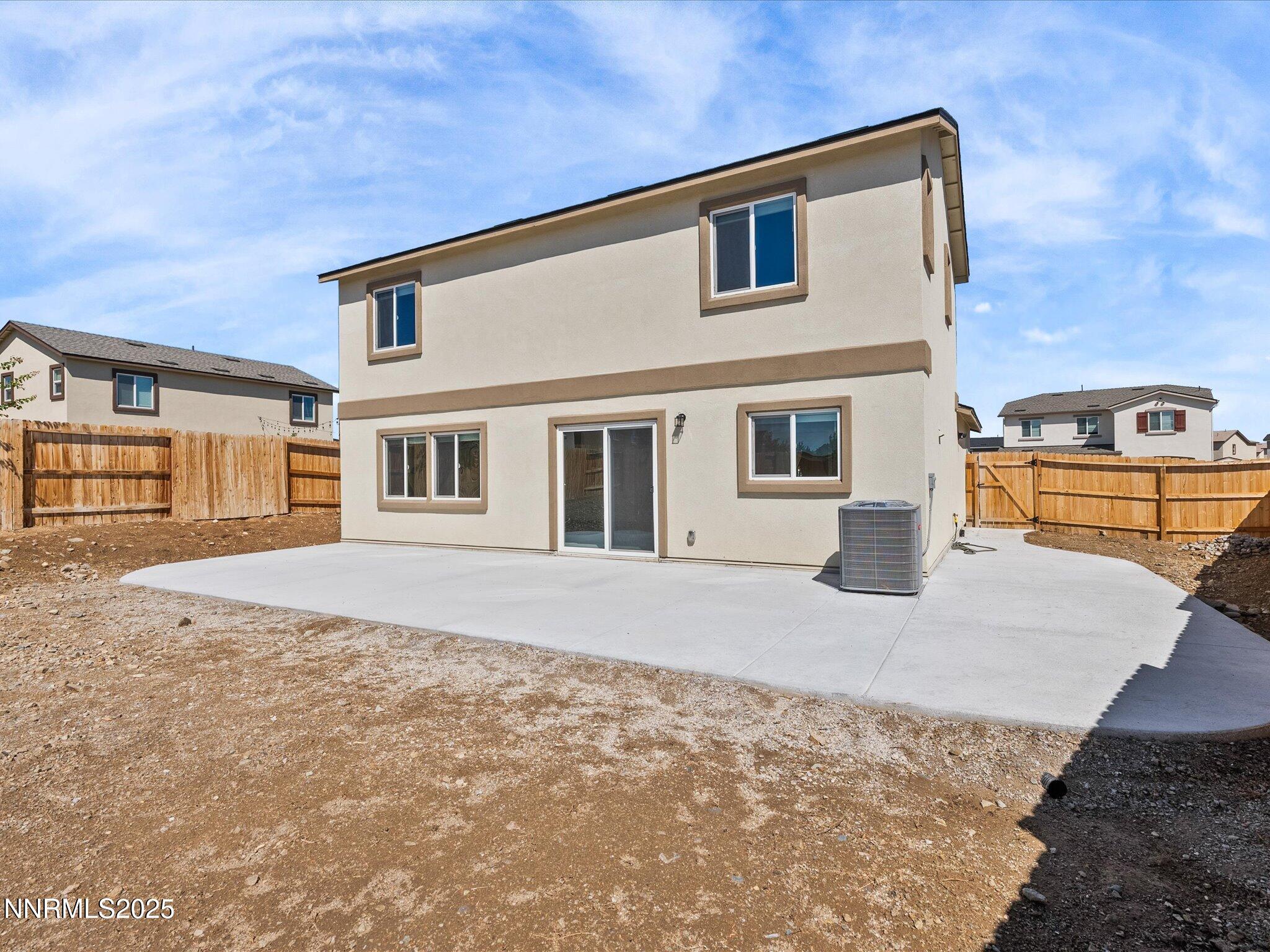 8838 Finnsech Drive Reno, NV 89506 - Photo 32 of 44 a front view of a house with a yard