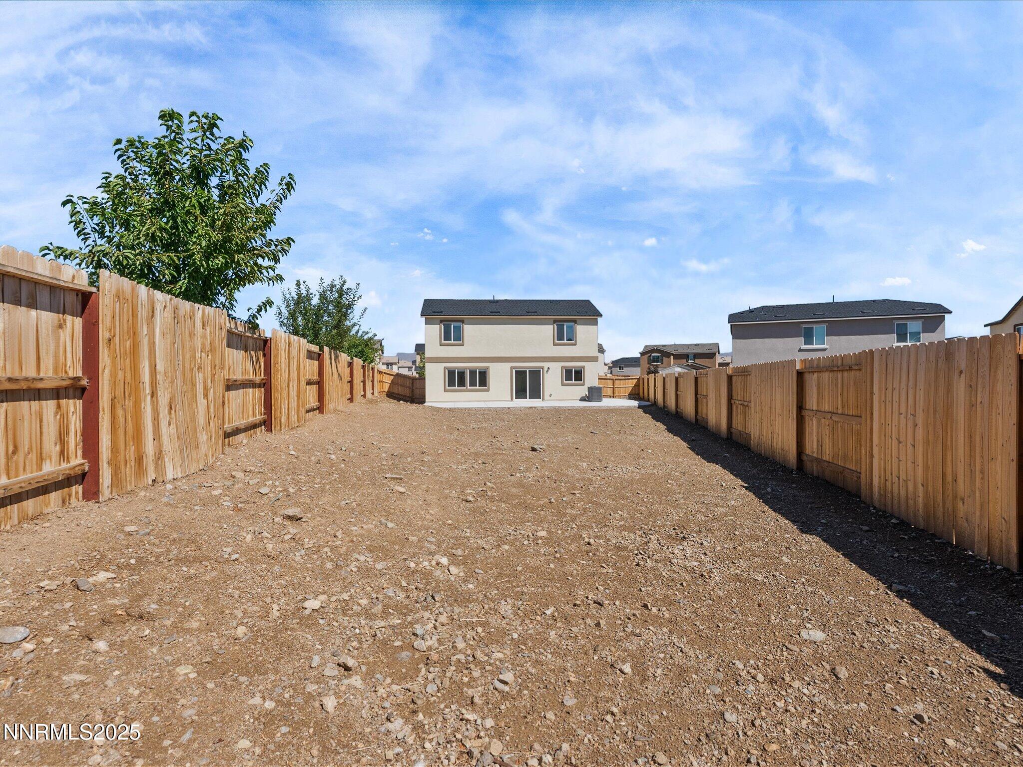 8838 Finnsech Drive Reno, NV 89506 - Photo 33 of 44 a view of a house with wooden fence
