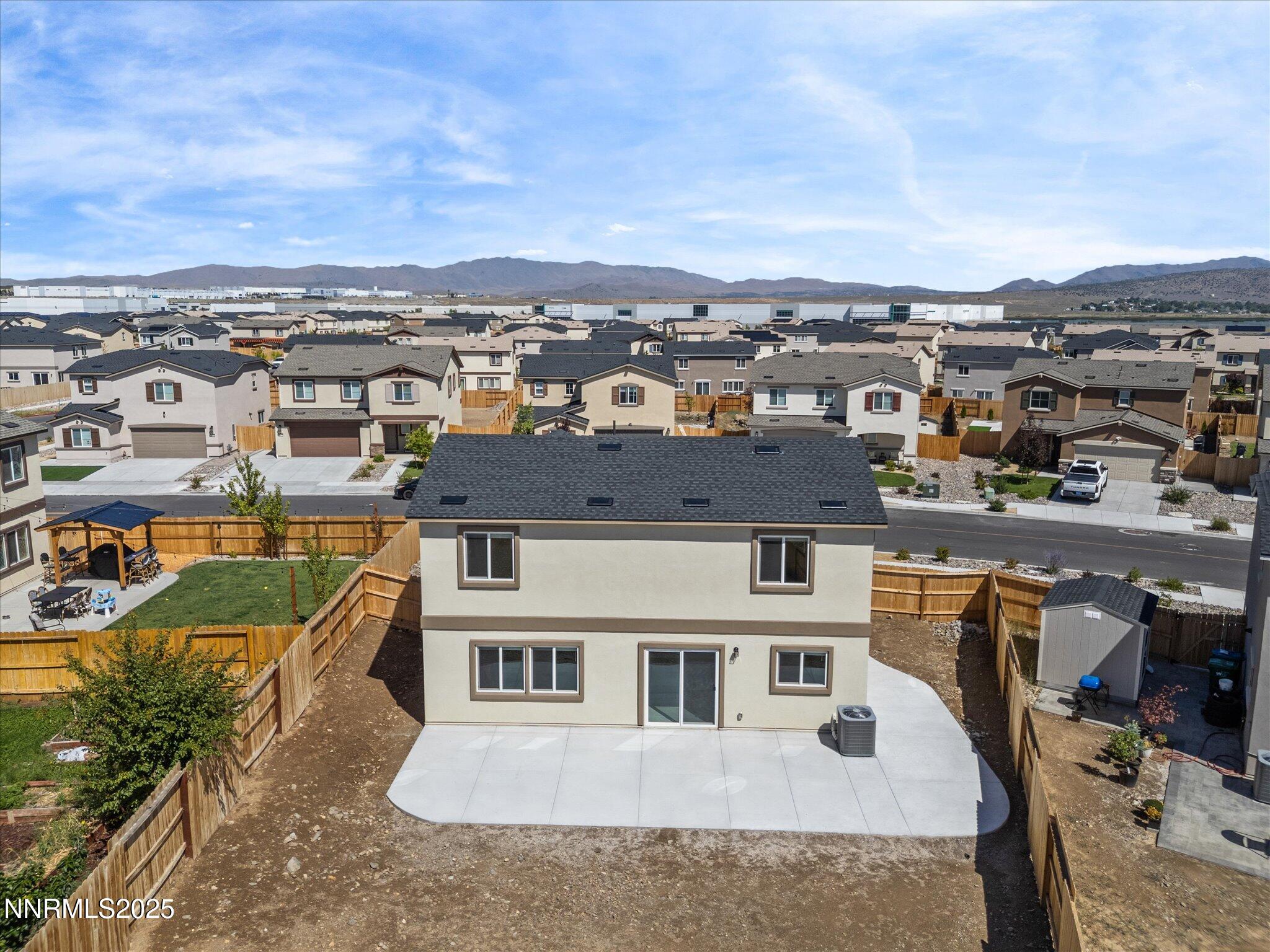 8838 Finnsech Drive Reno, NV 89506 - Photo 37 of 44 an aerial view of residential houses with city view