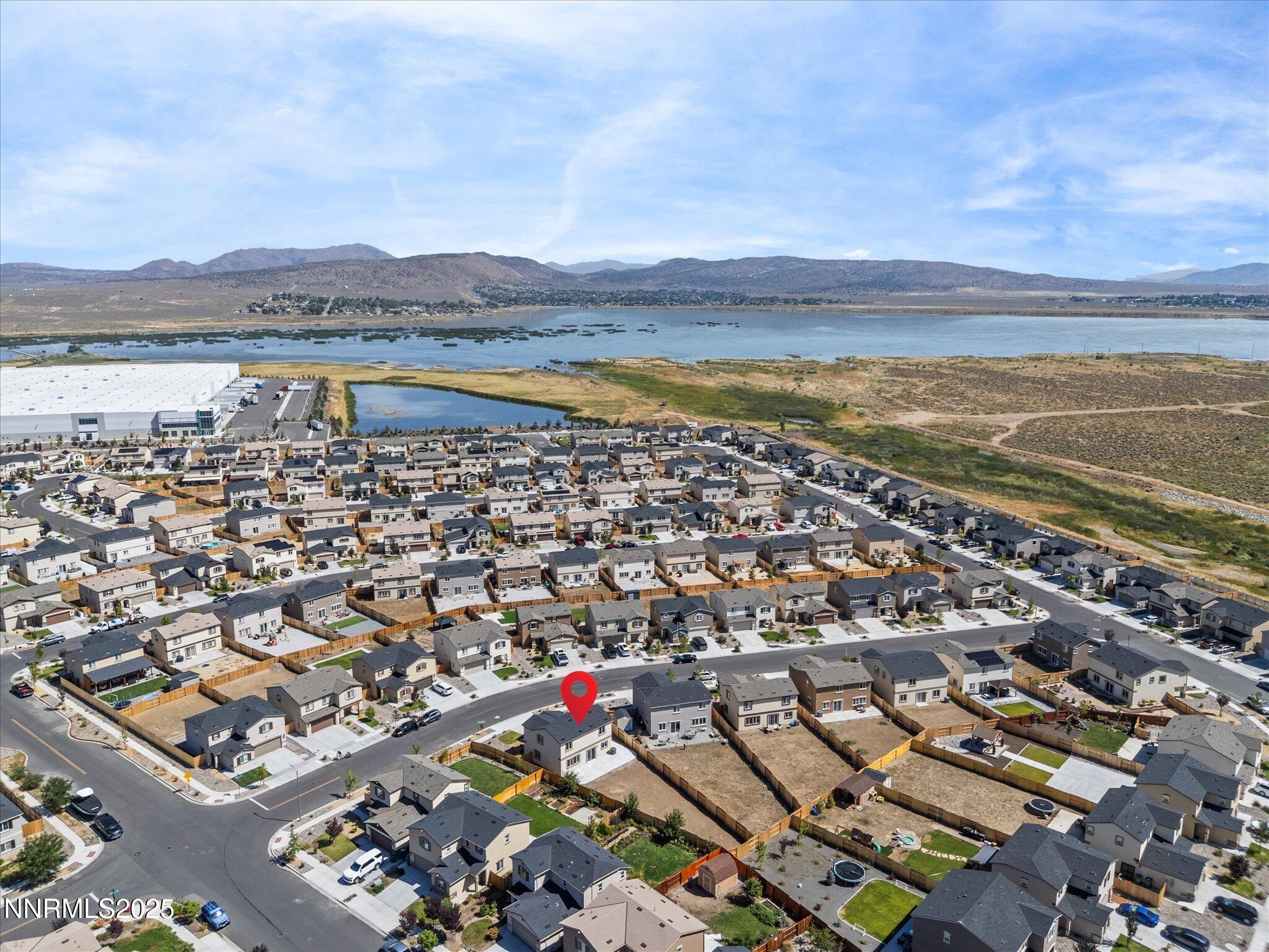 8838 Finnsech Drive Reno, NV 89506 - Photo 42 of 44 an aerial view of residential building with lake view
