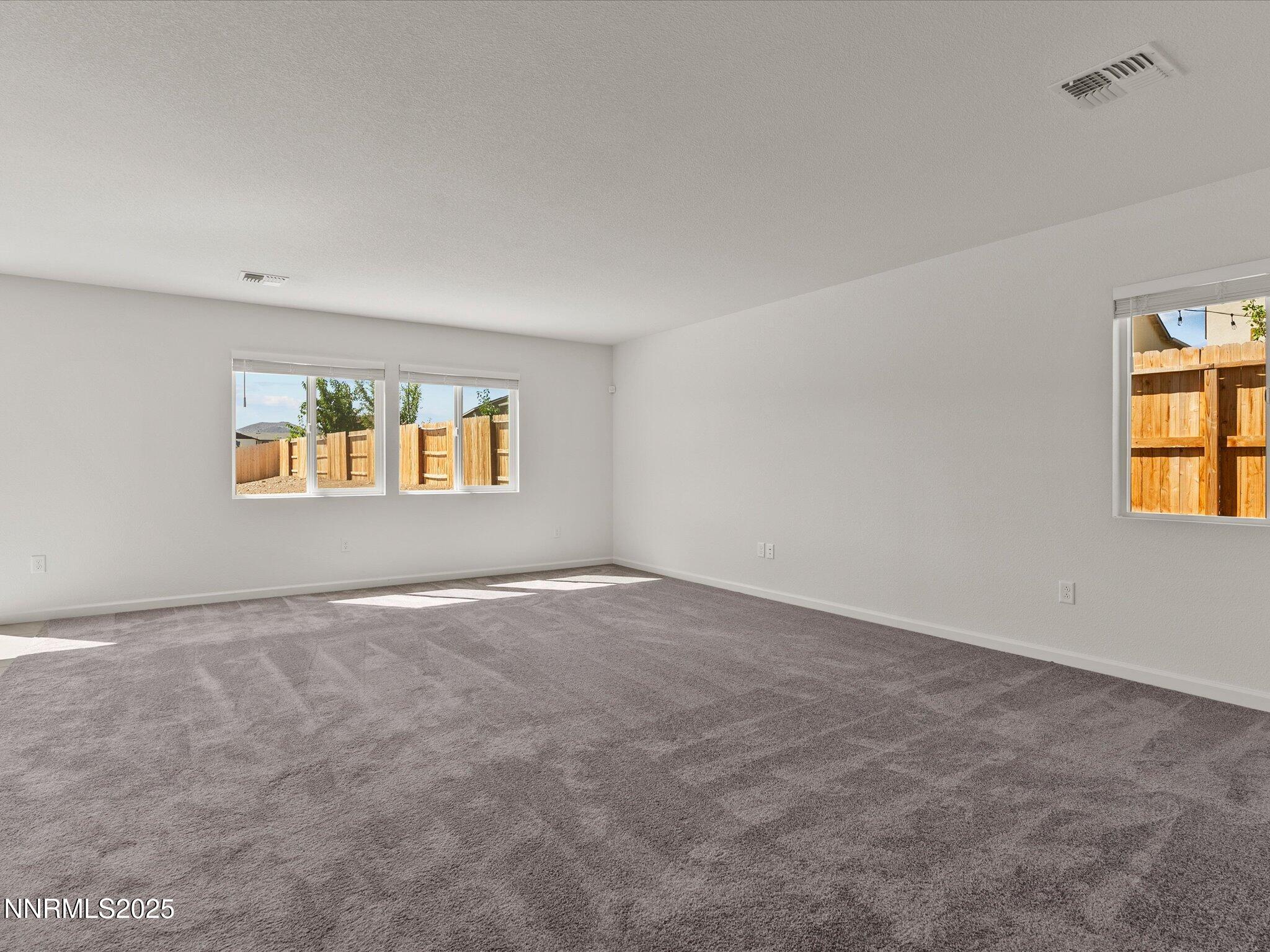 8838 Finnsech Drive Reno, NV 89506 - Photo 6 of 44 an empty room with a window