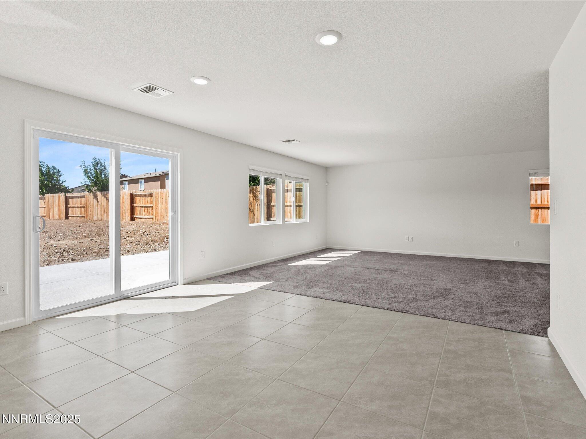 8838 Finnsech Drive Reno, NV 89506 - Photo 8 of 44 a view of an empty room with a window