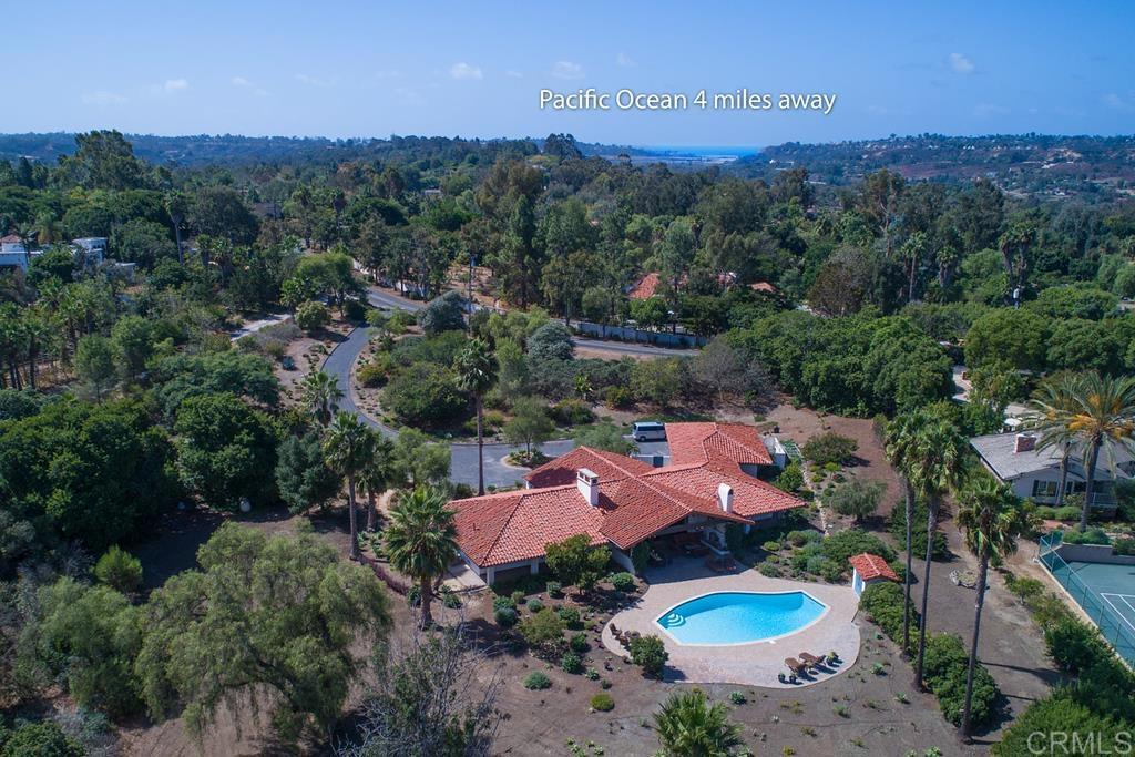 17925 Avenida Alondra Rancho Santa Fe, CA 92067 - Photo 7 of 11 an aerial view of a house with outdoor space