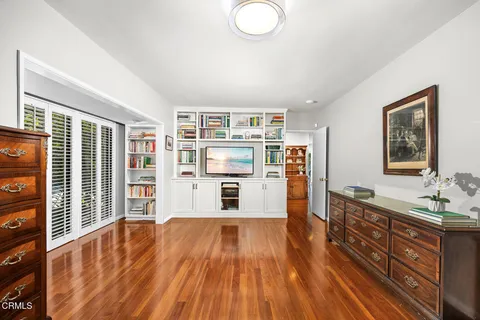 a bathroom with a sink toilet and a mirror