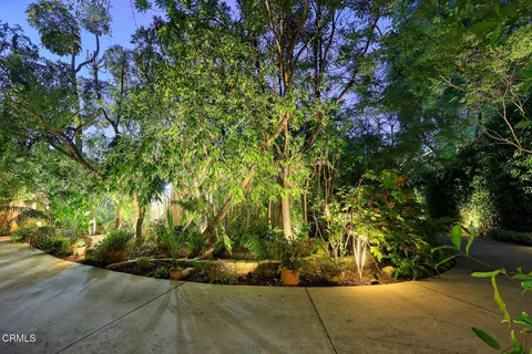 a backyard of a house with lots of green space