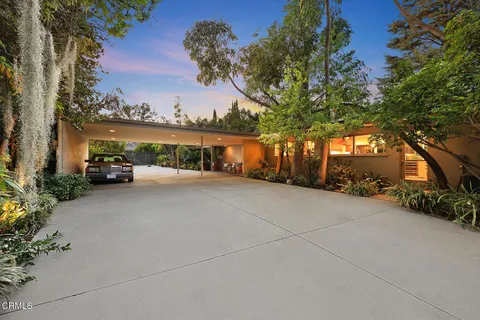 a view of a yard with an outdoor space