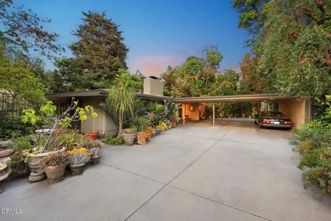 a view of an outdoor space and swimming pool