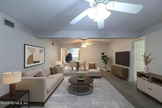 a kitchen with a refrigerator and a sink