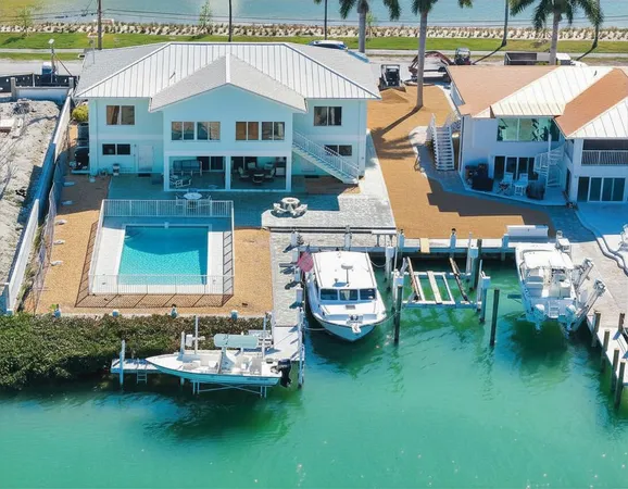 $3,450,000 | 900 Shelter Bay Drive, Key Colony Beach, FL 33051