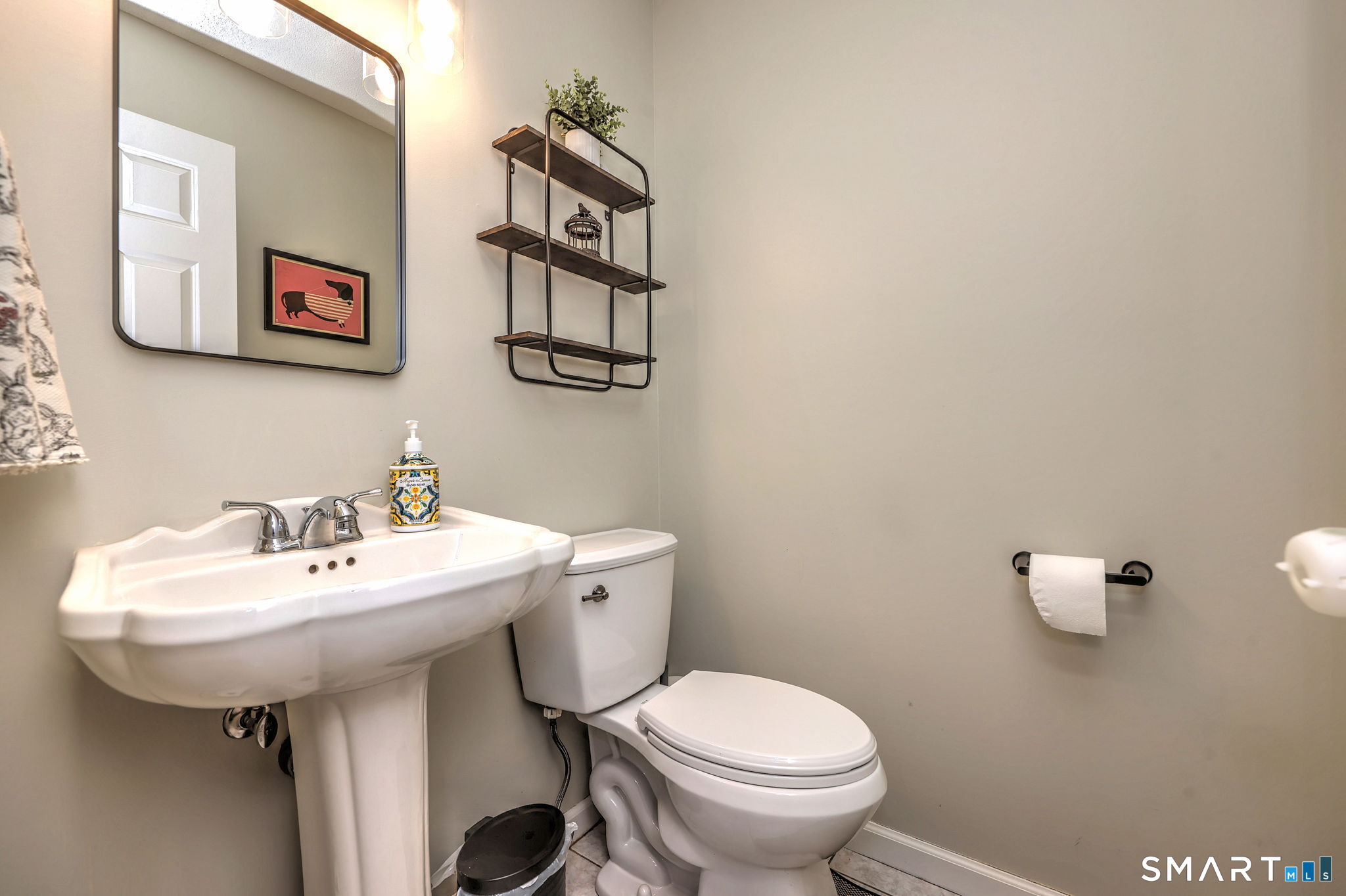 112 Finch Avenue Meriden, CT 06451 - Photo 17 of 40 a bathroom with a sink toilet and a mirror