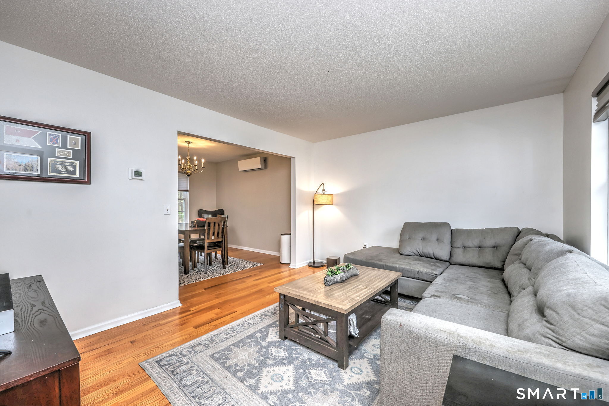 112 Finch Avenue Meriden, CT 06451 - Photo 3 of 40 a living room with furniture and wooden floor