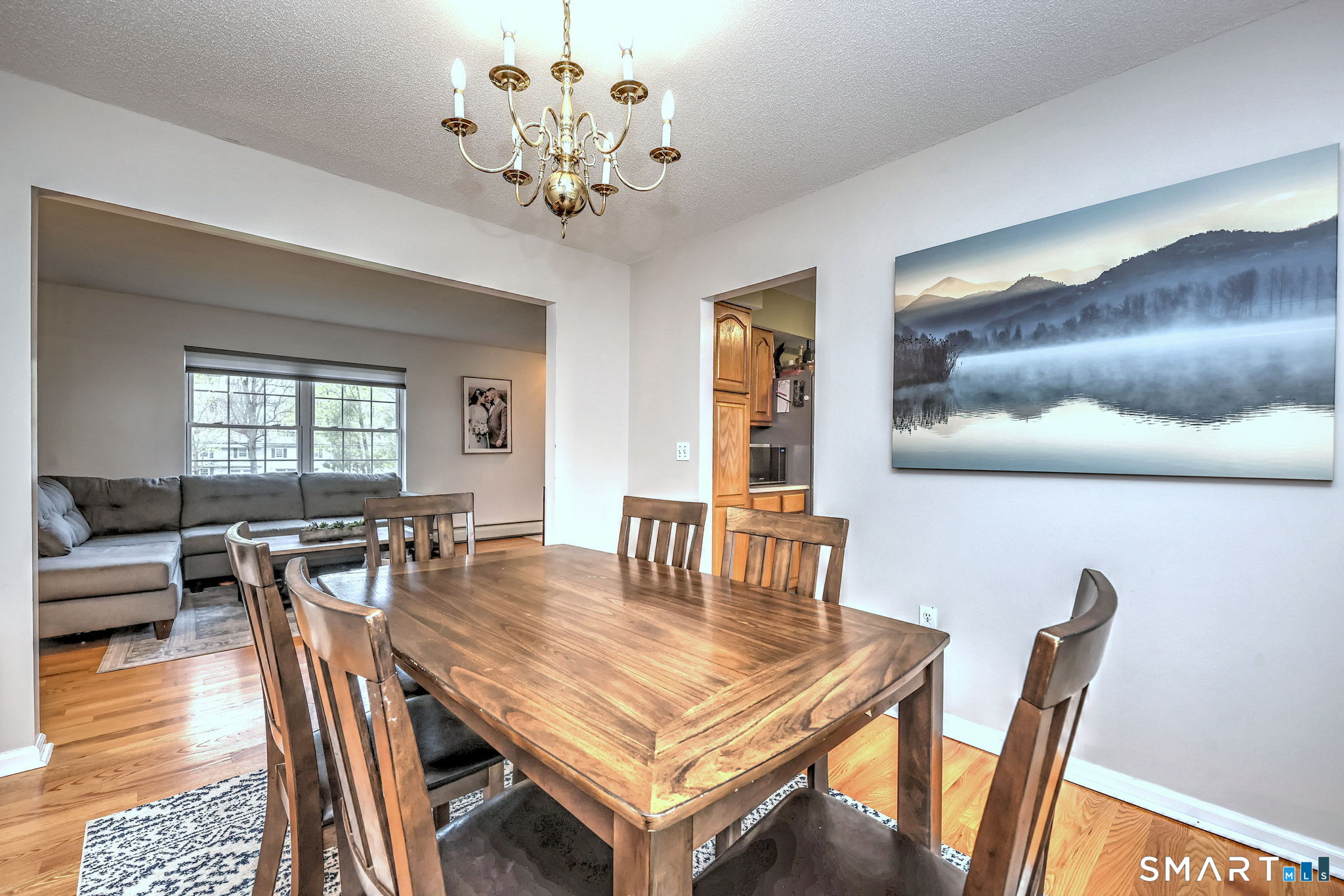 112 Finch Avenue Meriden, CT 06451 - Photo 8 of 40 a view of a dining room with furniture and wooden floor