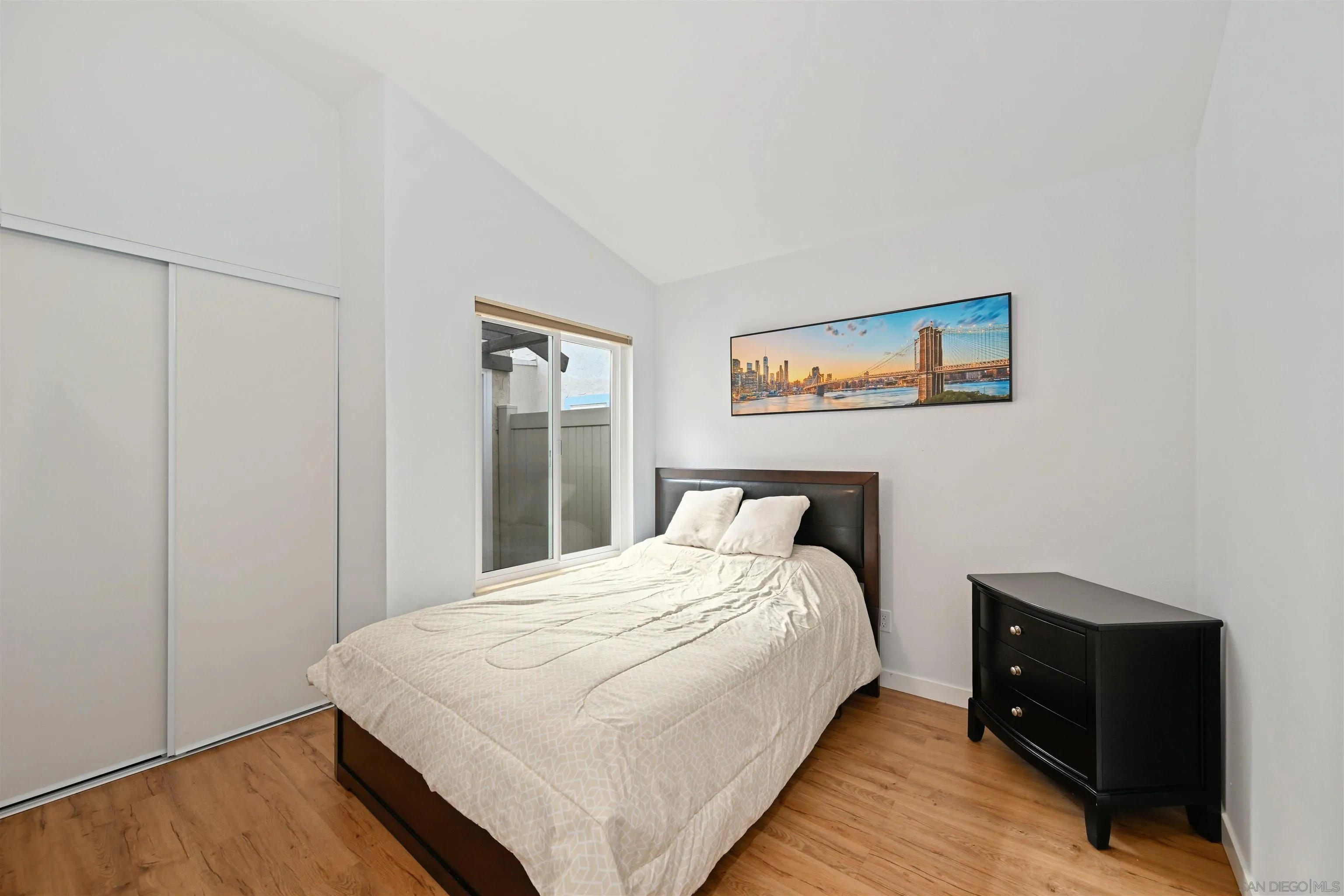 10314 Rochelle Avenue Santee, CA 92071 - Photo 12 of 25 a bedroom with a bed and a night stand