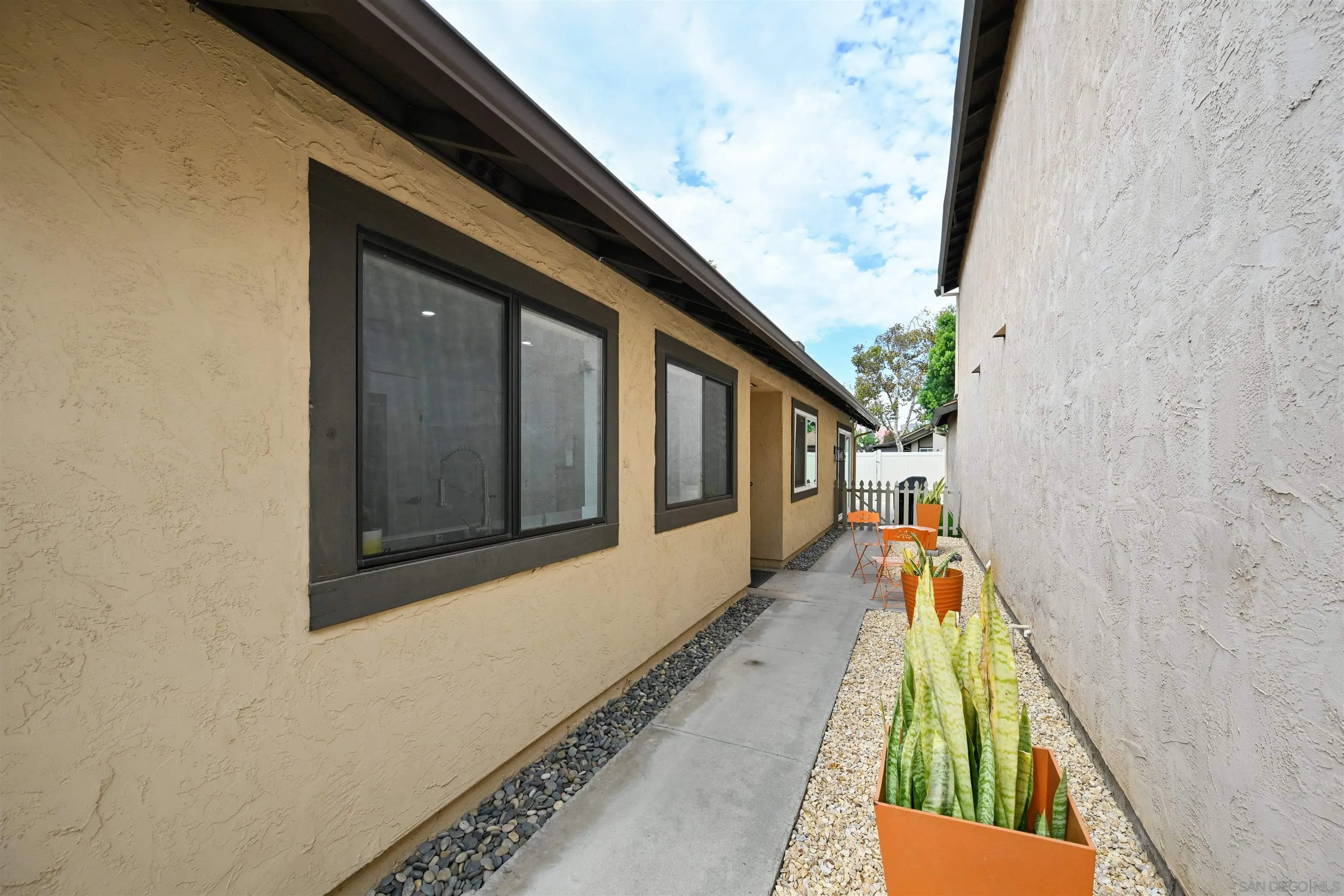 10314 Rochelle Avenue Santee, CA 92071 - Photo 17 of 25 a front view of a house with a yard