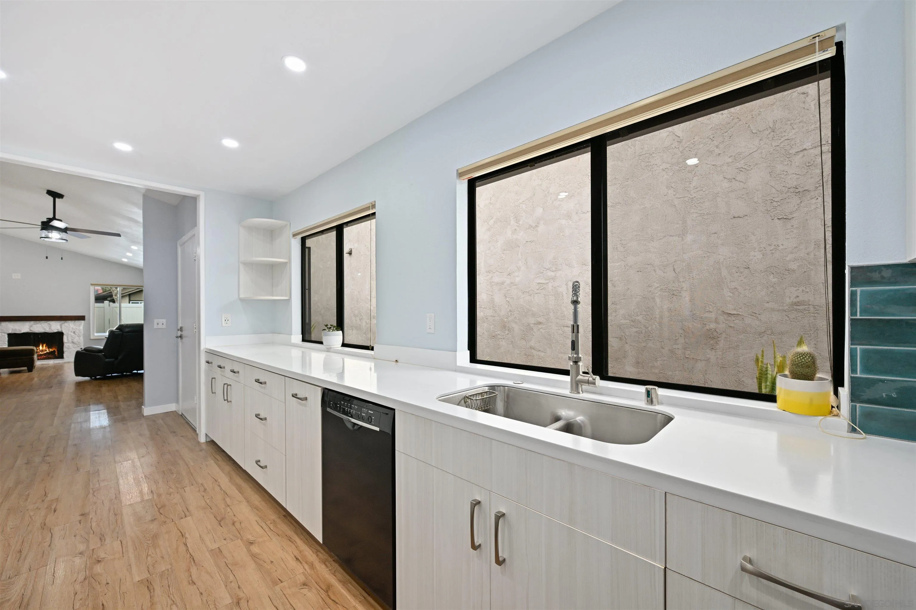 10314 Rochelle Avenue Santee, CA 92071 - Photo 3 of 25 a bathroom with a sink and a mirror