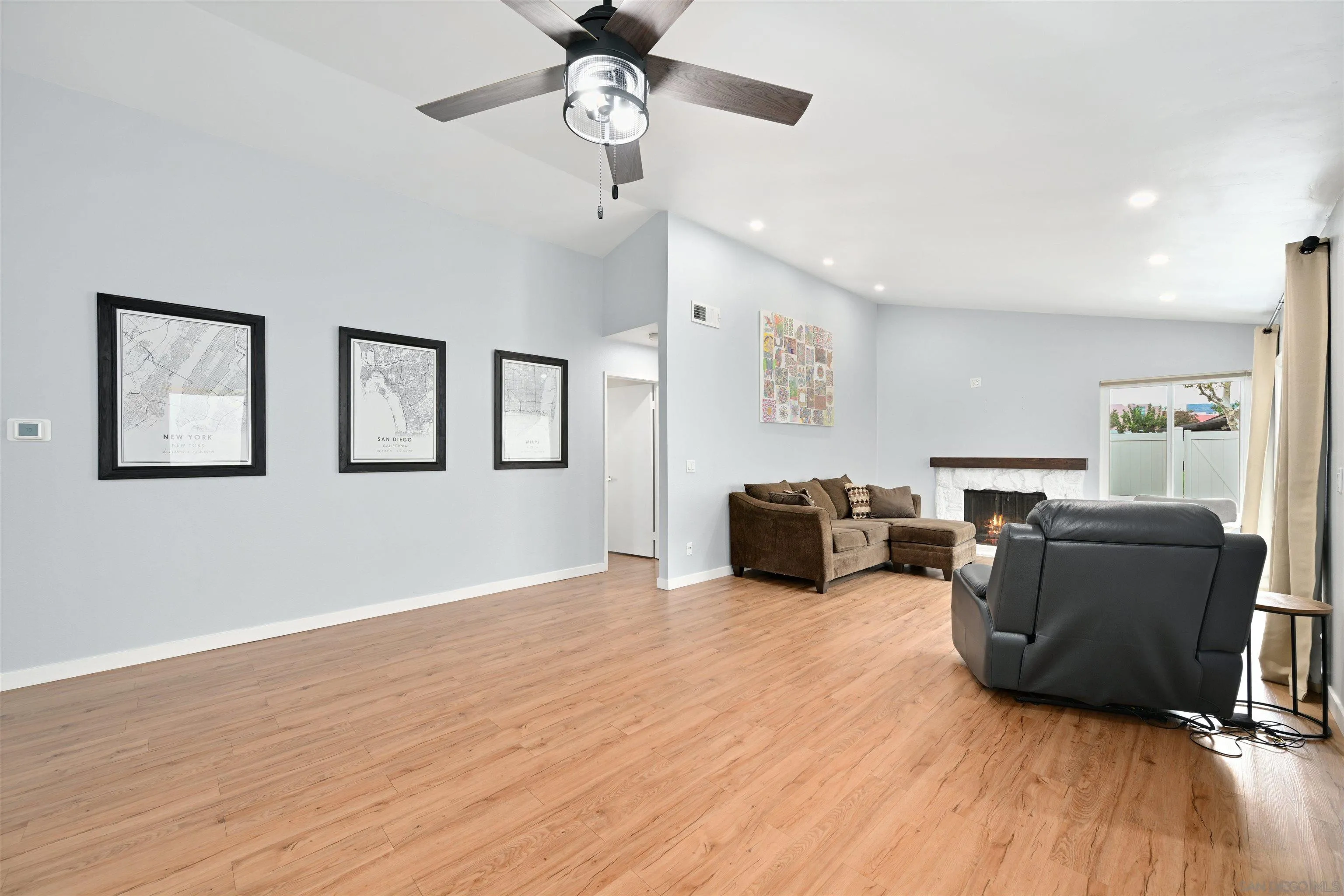 10314 Rochelle Avenue Santee, CA 92071 - Photo 5 of 25 a living room with furniture and a wooden floor