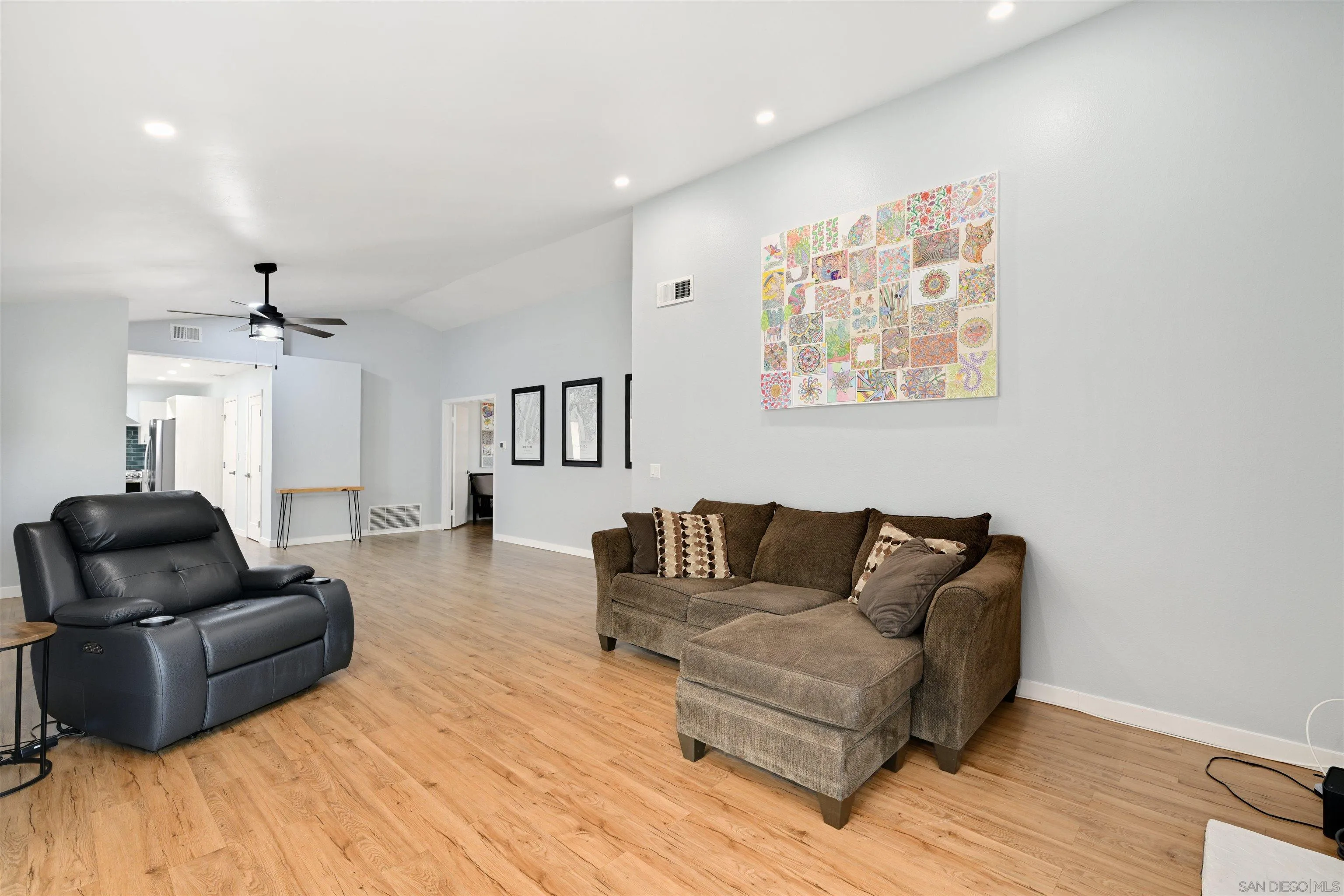 10314 Rochelle Avenue Santee, CA 92071 - Photo 7 of 25 a living room with furniture and a wooden floor