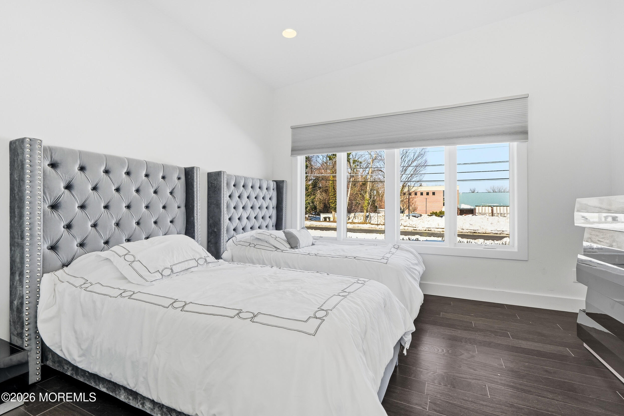 107 Grant Avenue Deal, NJ 07723 - Photo 17 of 38 a large white bed in a white room