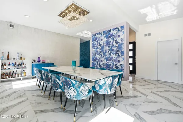 a view of a dining room with furniture