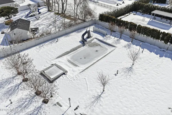 a view of a house with a bed and sitting area