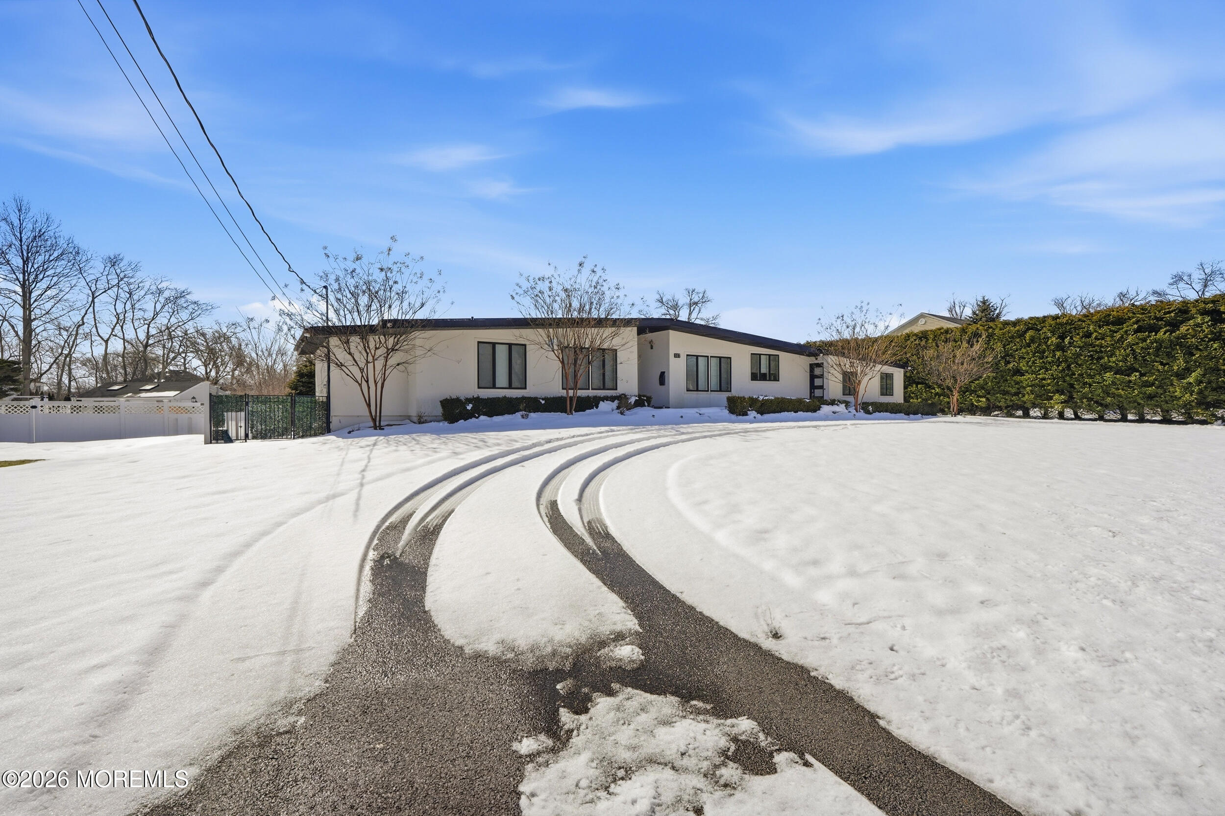 107 Grant Avenue Deal, NJ 07723 - Photo 32 of 38 a view of swimming pool with a yard and fence