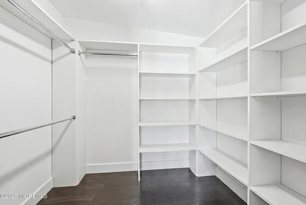 a storage room with wooden floor