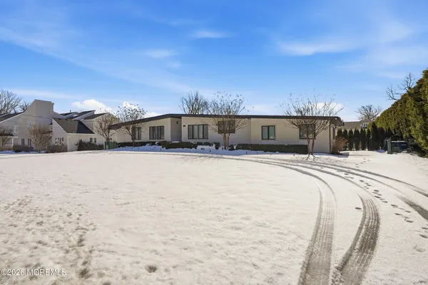 a view of swimming pool and a yard
