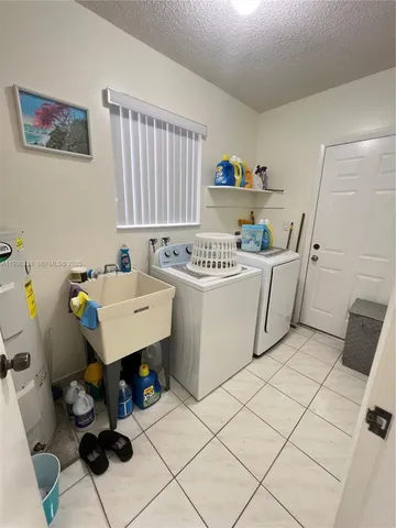 a view of storage and utility room