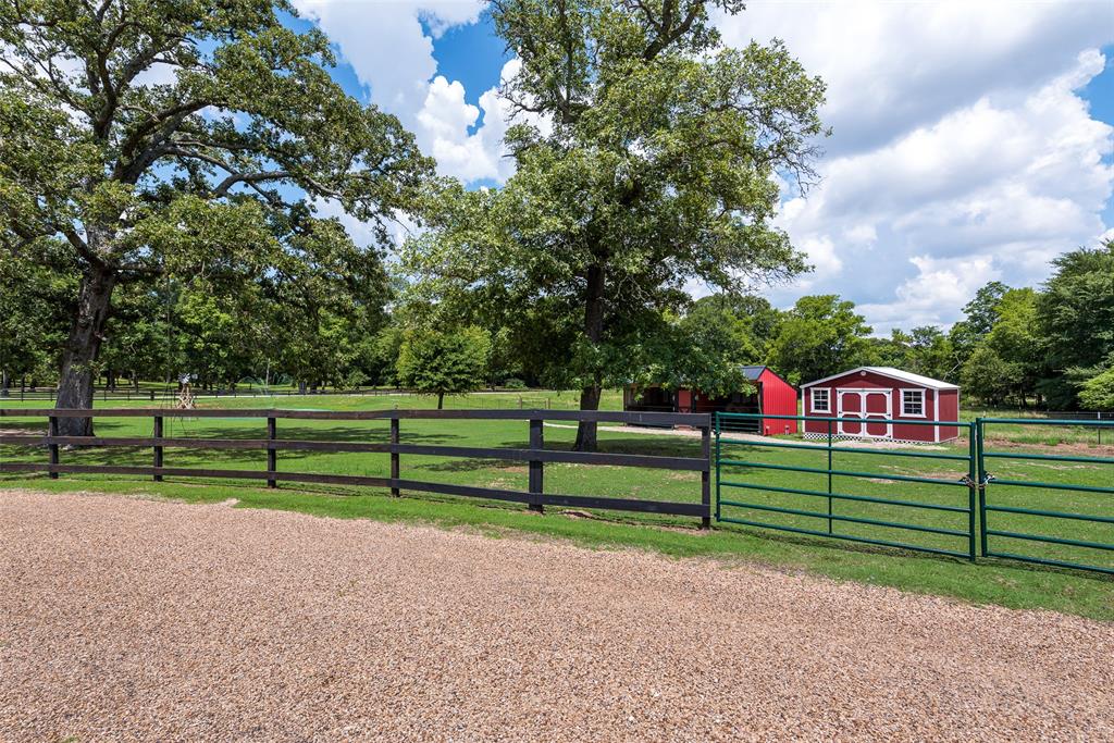 669 VZ County Road Canton, TX 75103 - Photo 5 of 40 a view of road with wooden fence