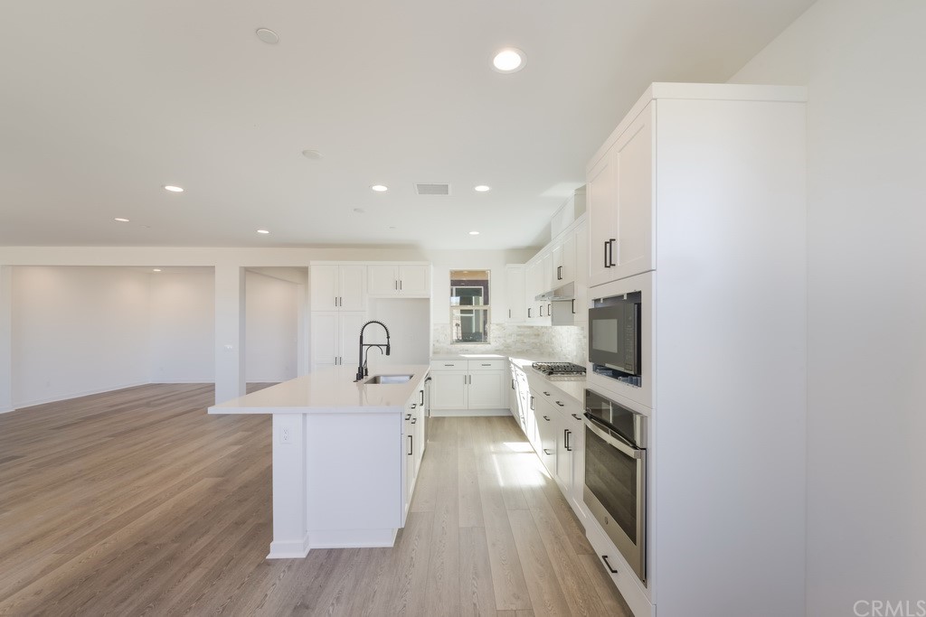 32318 Sonder Way Temecula, CA 92591 - Photo 2 of 18 a view of living room with furniture and a flat screen tv