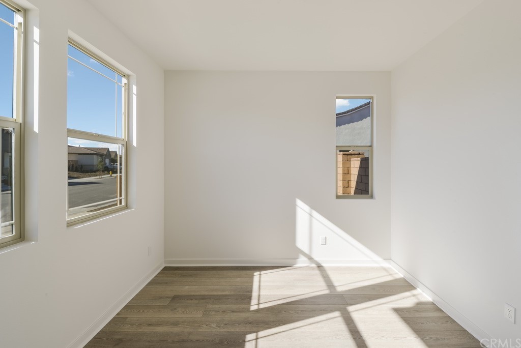 32318 Sonder Way Temecula, CA 92591 - Photo 6 of 18 a view of a hallway with windows