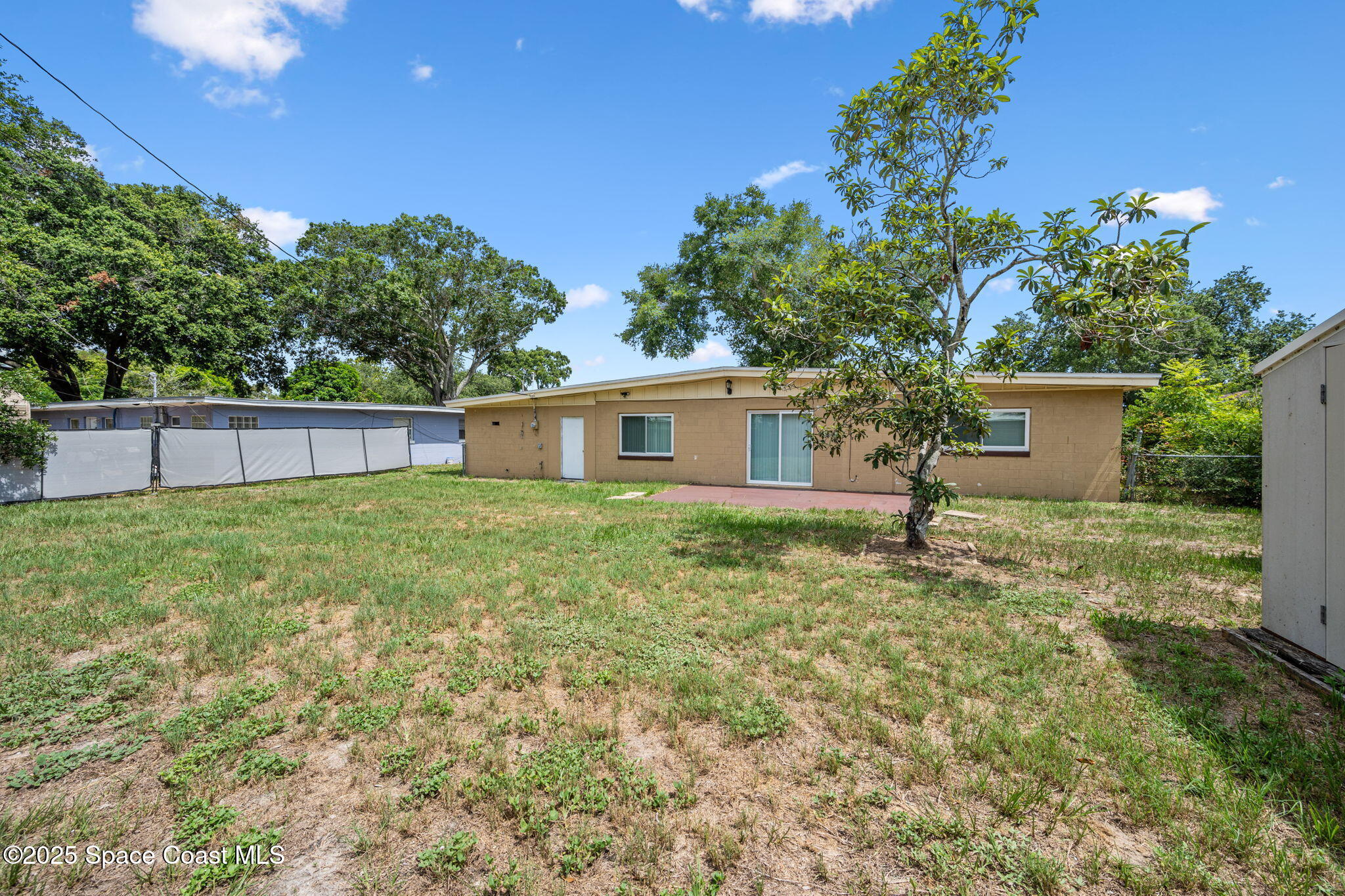 855 Delano Road Titusville, FL 32780 - Photo 25 of 28 Yard - Rear of house 2