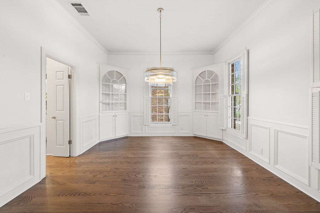 4 Rock Way Cove Austin, TX 78746 - Photo 11 of 26 a view of a room with wooden floor chandelier and windows