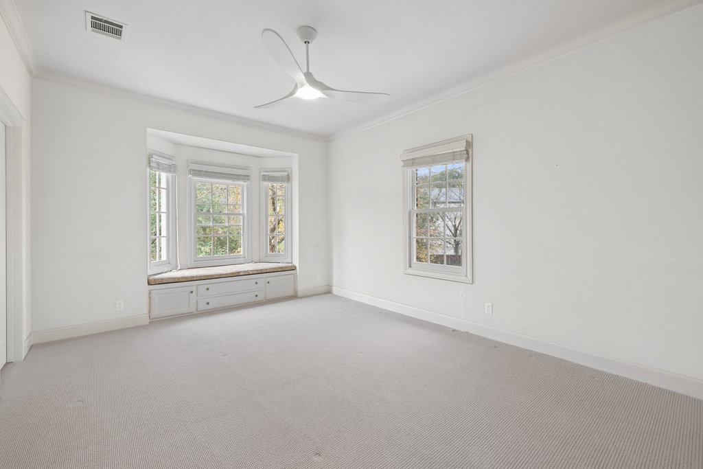 4 Rock Way Cove Austin, TX 78746 - Photo 19 of 26 an empty room with windows and closet