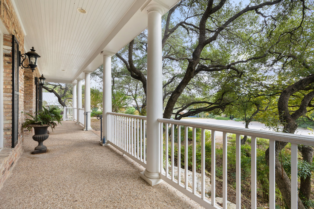 4 Rock Way Cove Austin, TX 78746 - Photo 4 of 26 a view of a porch with backyard and porch