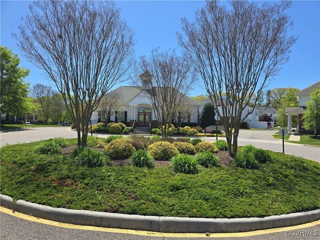 a view of a park with large trees
