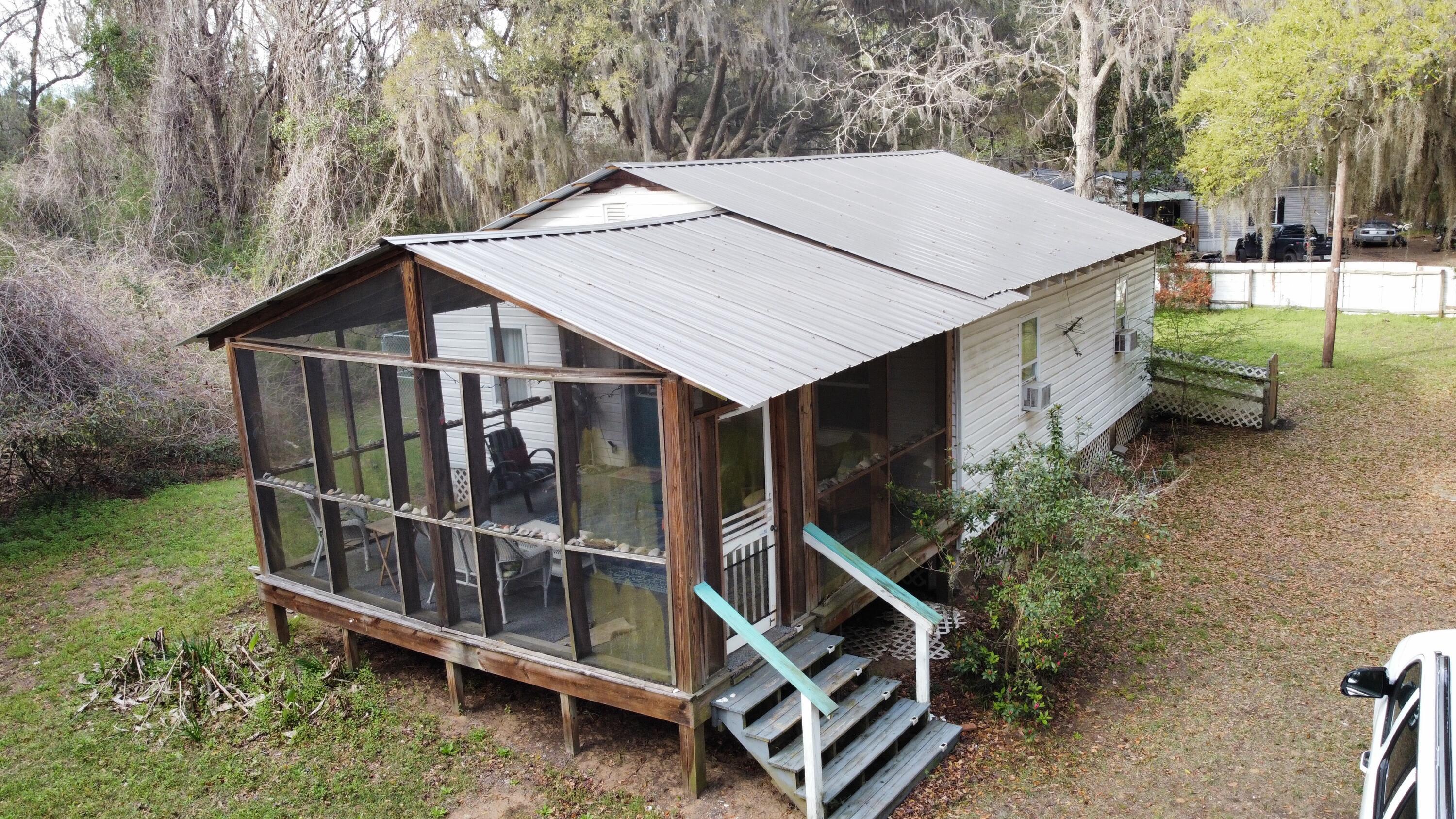 7778 Indigo Hill Road Edisto Island, SC 29438 - Photo 5 of 29 dji_fly_20260317_172706_3_1773783757017_