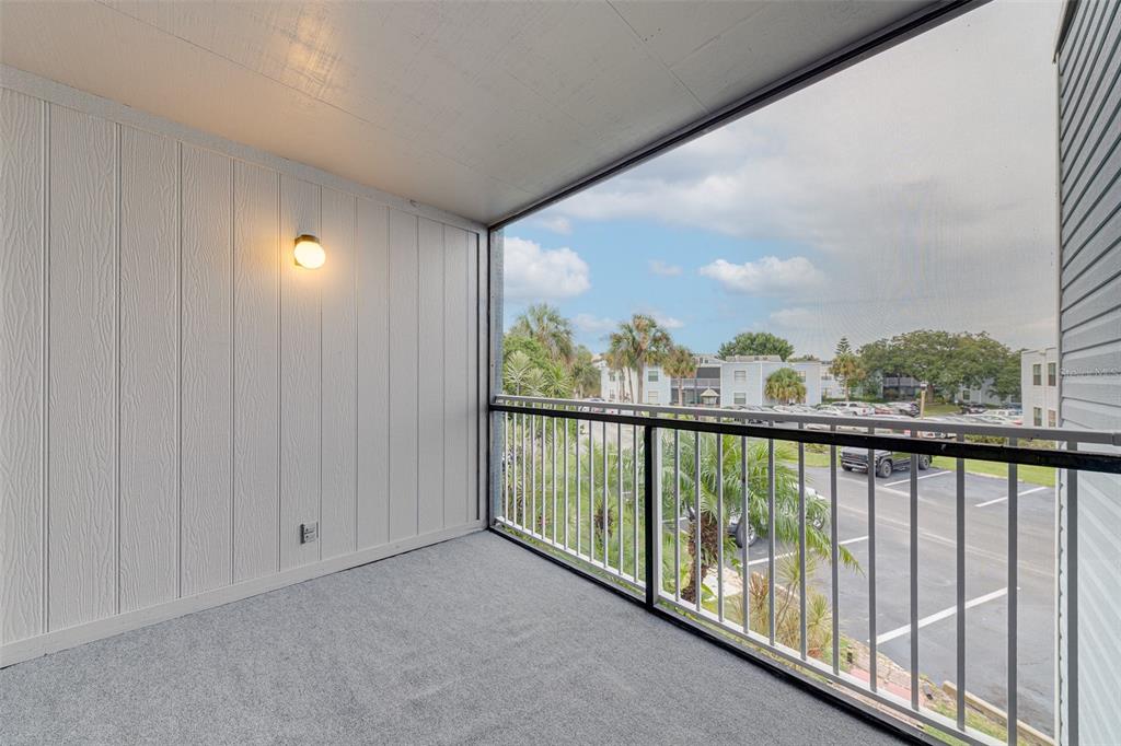 4004 Atrium Drive, Unit 4 Orlando, FL 32822 - Photo 21 of 24 a view of balcony with furniture