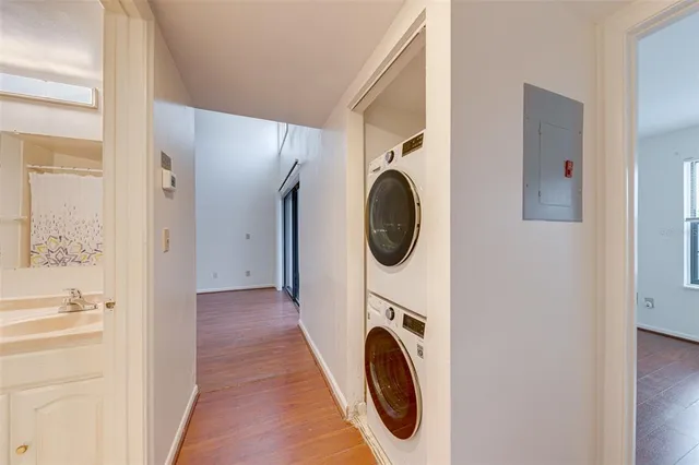 a view of a hallway with washer and dryer