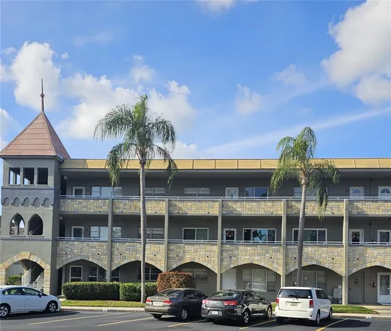 a front view of a building with street view