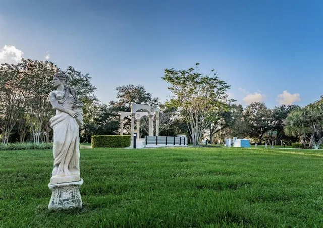 a garden view with a sitting space
