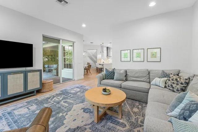 a bedroom with bed and a window