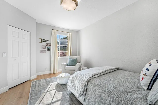 a patio with table and chairs