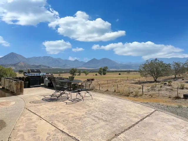 a view of a terrace with sitting area